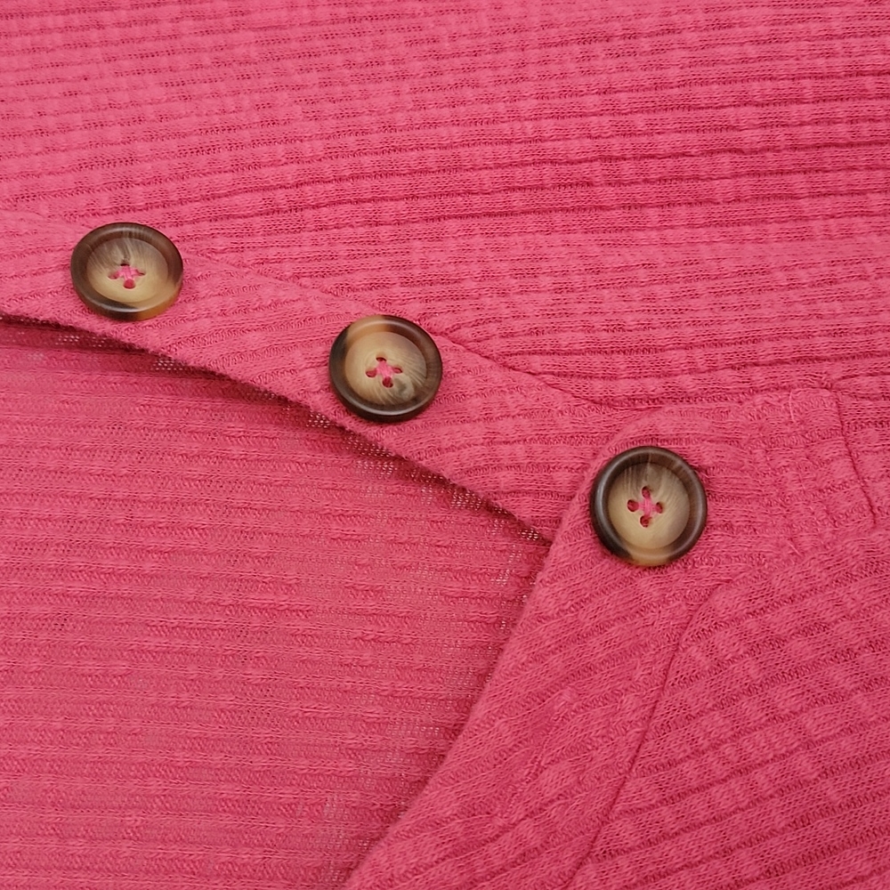 Pink long sleeved shirt with buttons